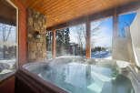 Enjoy the ultimate relaxation experience in this stunning property featuring a luxurious hot tub.