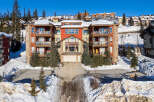 Discover luxury living at Snowbird Lodge, a stunning property nestled in a winter wonderland.