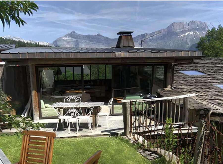 Discover a charming property nestled in a picturesque mountain setting.