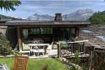 Discover a charming property nestled in a picturesque mountain setting.