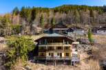 Discover a stunning chalet nestled in the mountains, offering breathtaking views and a serene atmosphere.