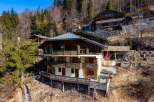 Discover a stunning chalet nestled in a picturesque mountain setting, offering breathtaking views and a tranquil escape.
