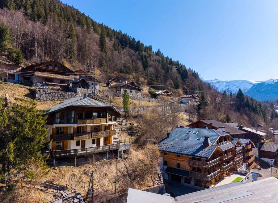 Discover the charm of this stunning mountain property, featuring multiple levels and balconies that offer breathtaking views.