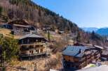 Discover the charm of this stunning mountain property, featuring multiple levels and balconies that offer breathtaking views.