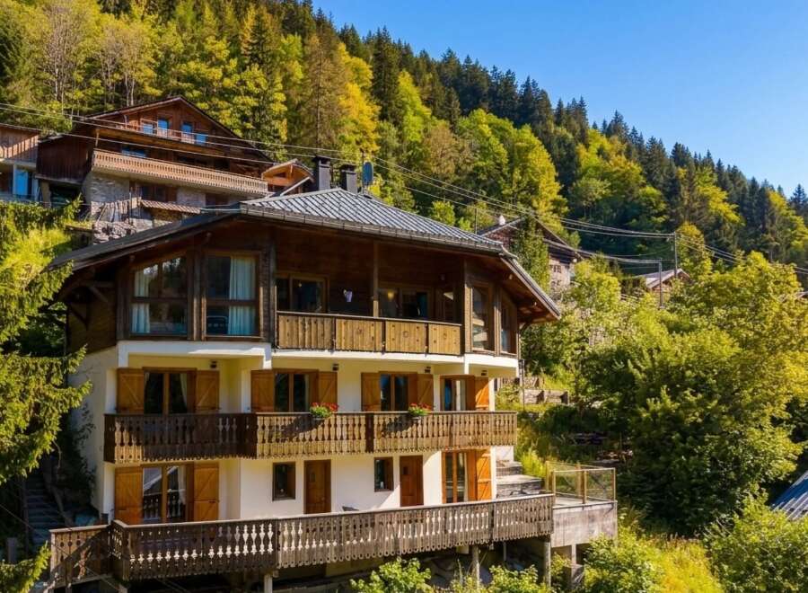 Nestled amidst lush greenery and rolling hills, this stunning multi-level chalet offers breathtaking mountain views and a serene escape.