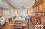 Step into a charming dining room with a classic, vintage aesthetic.