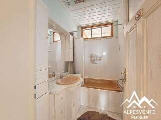 Discover this charming bathroom featuring a classic design and functional layout.