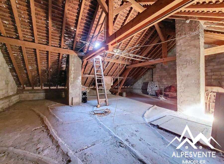 Discover the potential of this unique property! This spacious attic space offers a blank canvas for your renovation dreams.