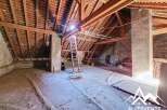 Discover the potential of this unique property! This spacious attic space offers a blank canvas for your renovation dreams.