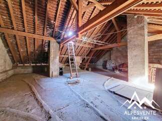 Discover the potential of this unique property! This spacious attic space offers a blank canvas for your renovation dreams.