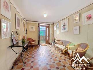 Discover the charm of this inviting property, featuring a welcoming entrance hall adorned with artistic touches.