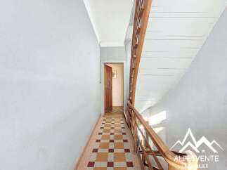 Discover this charming property featuring a classic staircase and a welcoming hallway.