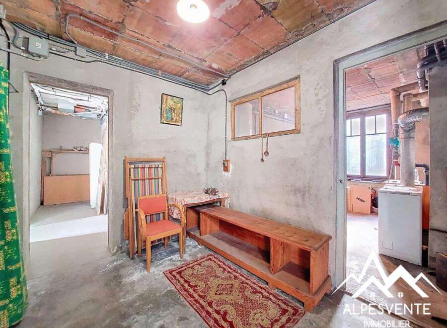 Discover the potential of this unique property! This space features a rustic interior with exposed brick ceilings and a cozy atmosphere.
