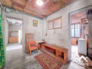 Discover the potential of this unique property! This space features a rustic interior with exposed brick ceilings and a cozy atmosphere.