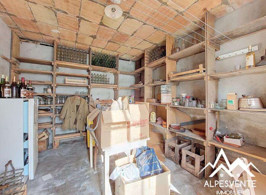 Discover the charm of this unique property, featuring a rustic wine cellar perfect for storage and display.