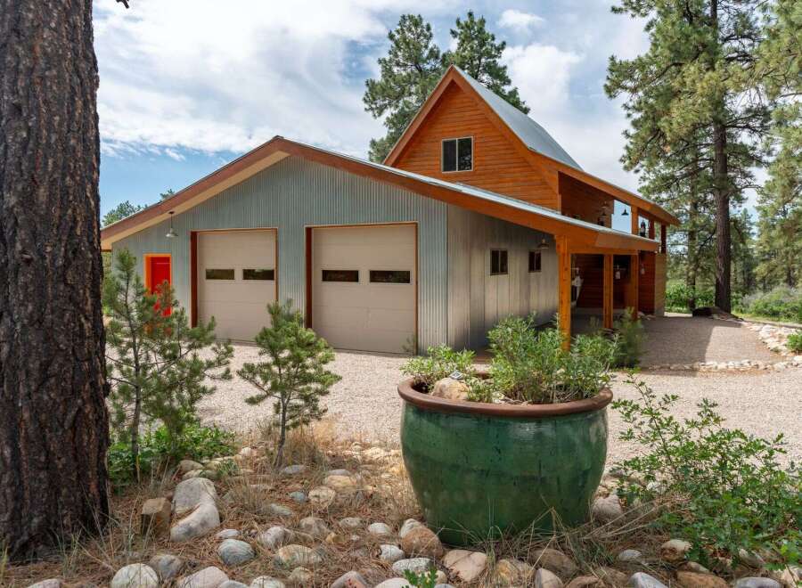 This stunning property boasts a unique blend of rustic charm and modern design.