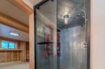Step into a unique and stylish shower space! This modern bathroom features a sleek glass enclosure and industrial-inspired design.