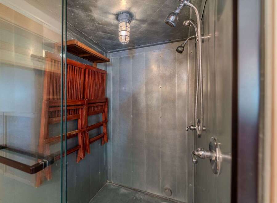 Step into a unique shower space with a modern industrial design.