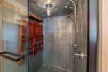Step into a unique shower space with a modern industrial design.