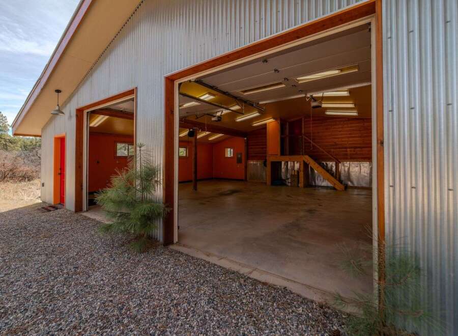 Discover the potential of this versatile property! This spacious garage offers ample room for vehicles, projects, or storage.