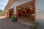 Discover the potential of this versatile property! This spacious garage offers ample room for vehicles, projects, or storage.
