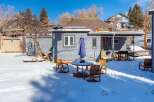 This charming property boasts a cozy outdoor space perfect for enjoying the crisp winter air.