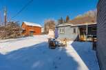 This charming property boasts a cozy outdoor space perfect for enjoying the crisp winter air.