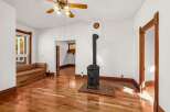 Step into this charming home and be greeted by the warmth of hardwood floors and natural light.