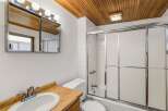Step into this inviting bathroom featuring a sleek vanity and a bright, well-lit space.