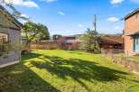 Enjoy the tranquility of this beautiful backyard, perfect for relaxation and outdoor activities.
