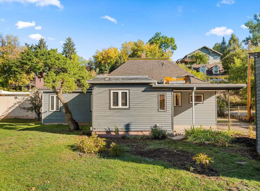 This charming property boasts a well-maintained exterior with a classic design.