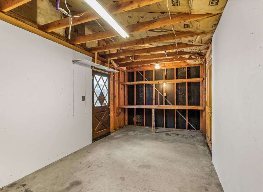 Explore the potential of this unfinished space, perfect for customization.