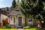 Charming home with a welcoming facade, featuring a well-maintained exterior and inviting front porch.