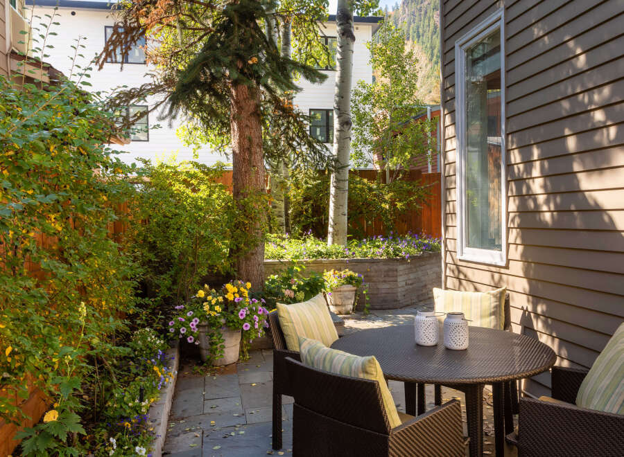 Enjoy the tranquility of this beautiful outdoor patio, perfect for relaxing or entertaining.