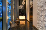 Step into luxury with this stunning lobby featuring modern design and elegant finishes.