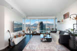 Experience luxury living in this stunning condo with breathtaking city and mountain views.