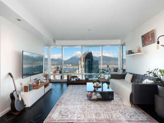 Experience luxury living in this stunning condo with breathtaking city and mountain views.
