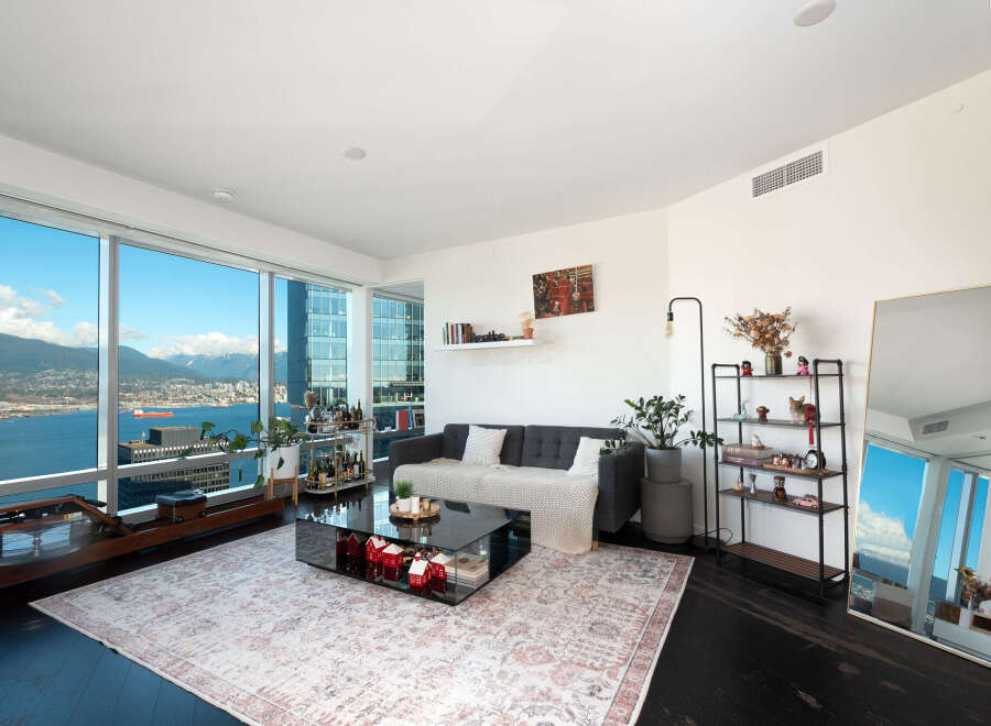 Experience luxury living in this stunning apartment with breathtaking city and water views.