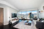 Experience luxury living in this stunning condo with breathtaking city and mountain views.