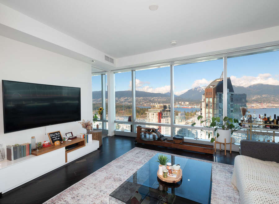 Experience luxury living in this stunning condo with breathtaking city and mountain views.