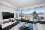 Experience luxury living in this stunning condo with breathtaking city and mountain views.