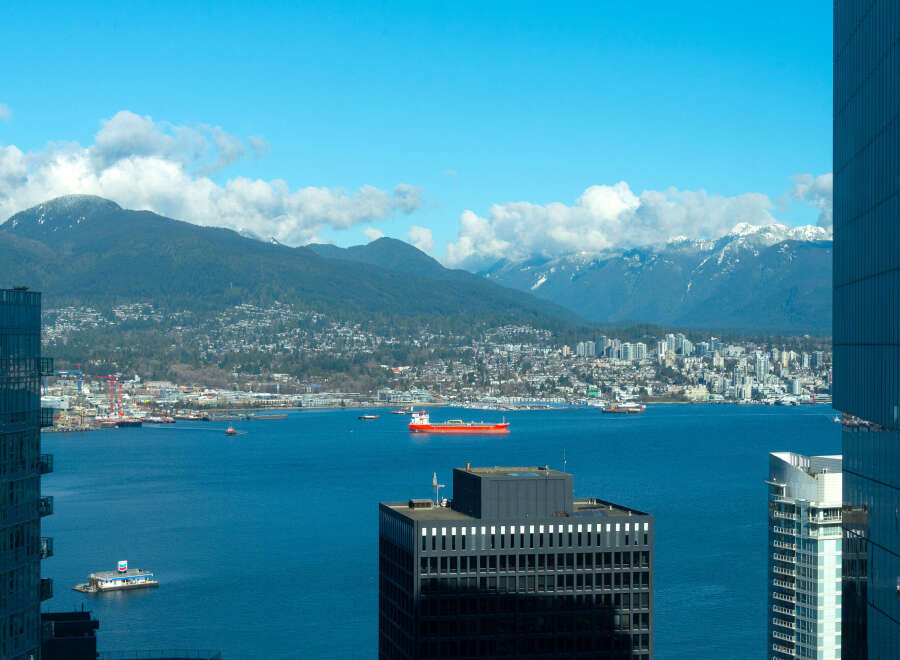 Enjoy breathtaking views of the city and mountains from this stunning property.