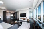 Experience luxury living in this stunning modern condo with breathtaking city views.
