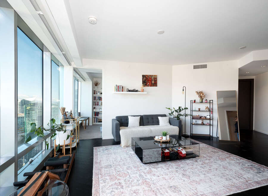 Experience luxury living in this stunning high-rise apartment with breathtaking city views.