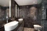 Experience luxury in this modern bathroom featuring sleek design and high-end finishes.