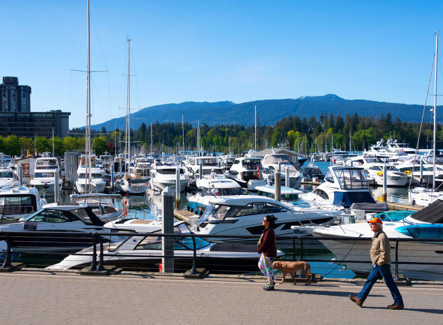 Discover waterfront living at its finest! This stunning property boasts a prime location with direct access to a marina, perfect for boating enthusiasts.