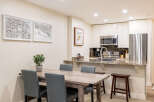 This stunning kitchen and dining area offers a perfect blend of style and functionality.