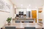 This stunning property features a modern kitchen with stainless steel appliances and granite countertops, perfect for culinary enthusiasts.