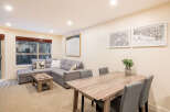 Step into this inviting living space, perfect for relaxation and entertaining.