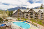 Discover luxury living in this stunning property, featuring a beautiful outdoor pool and breathtaking mountain views.